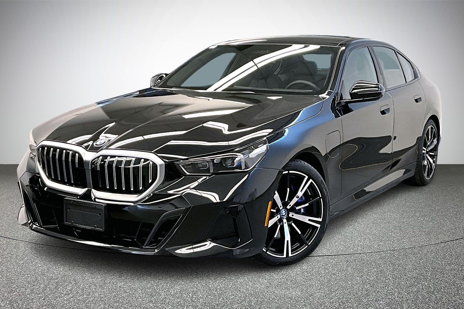 Black Sapphire Metallic 2025 BMW 5 Series 550e xDrive Sedan All-Wheel Drive Manual